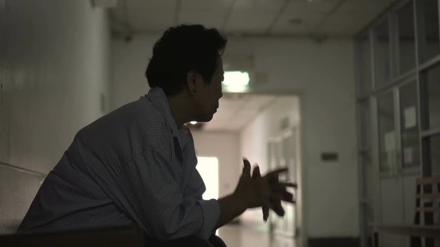 Asian senior elderly man worry about health medication fee at hospital