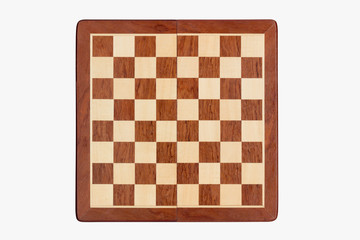 empty wooden chessboard isolated on white background, top view