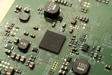 A complex PCB mounted board with surface mount electronic parts