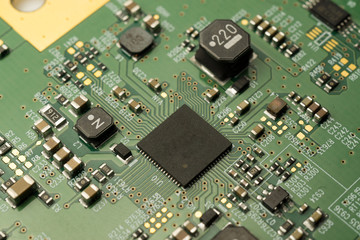 A complex PCB mounted board with surface mount electronic parts