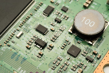 A complex PCB mounted board with surface mount electronic parts