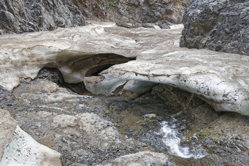 Dirty, melting snow in the mountains.