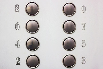 Number buttons in the Elevator on grey background