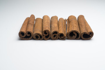 Cinnamon and Anise on white background isolated