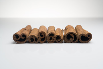 Cinnamon and Anise on white background isolated