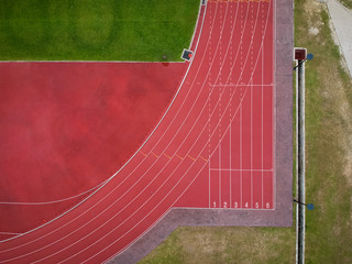 Aerial Top down view of Athlete Running Tracks