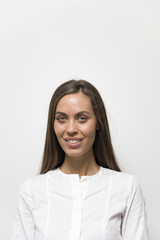 Obraz premium Smiling businesswoman with against white background