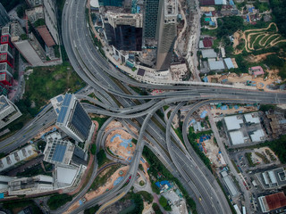 Aerial view of elevated higway with multiple exit and junctions on an urban city area