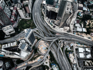 Aerial view of elevated higway with multiple exit and junctions on an urban city area