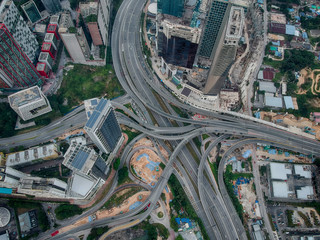 Aerial view of elevated higway with multiple exit and junctions on an urban city area