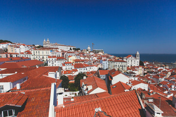 Beautiful super-wide angle aerial panoramic view of Lisbon, Portugal, with Alfama district and historical old town, seen from the observation deck belvedere