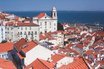 Fototapeta premium Beautiful super-wide angle aerial panoramic view of Lisbon, Portugal, with Alfama district and historical old town, seen from the observation deck belvedere