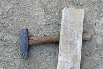 close-up of iron hammer, hammer in hand tools

