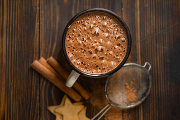 Hot chocolate in a mug with cookies. Winter drink concept. Overhead wiew