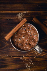 Hot chocolate in a mug with cookies. Winter drink concept. Overhead wiew