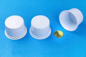 game thimbles with bitcoin on a blue background