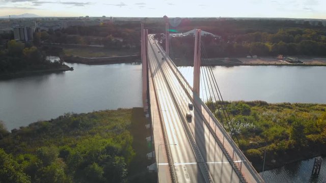 camera moving above the suspension bridge over the Odra river in Wroclaw (aerial)