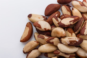 brazil nut on a white acrylic background