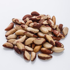 brazil nut on a white acrylic background