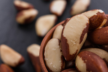 brazil nut on a dark stone background