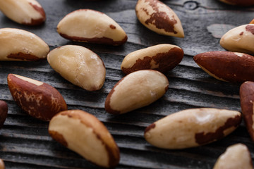 brazil nut on a dark rustic wooden background