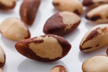 brazil nut on a white acrylic background