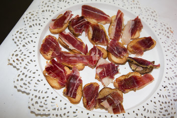 small appetizers of Italian pork ham