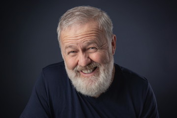Old man portrait smiling fake