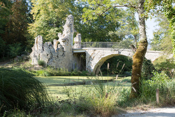 old medieval stone bridge over the river in Blanquefort France