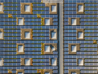 Aerial view of solar cells on rooftop for clean power generatino in Switzerland, Europe