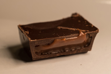 Pieces of chocolate bar filled with chocolate cream
