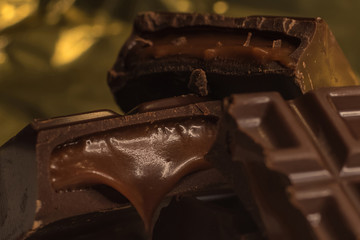 Pieces of chocolate bar filled with chocolate cream