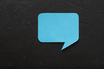 empty speech bubble on black background. icon of social media communication and ideas