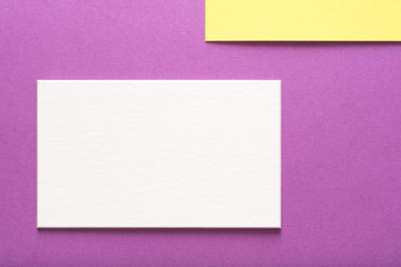 blank white paper on purple background. empty space for message or text. communication and...