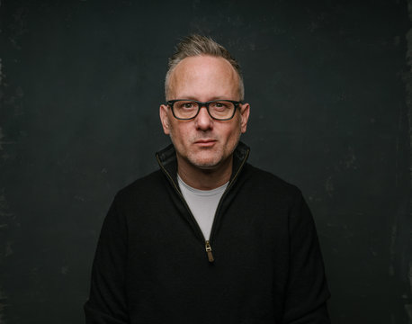 middle-aged man wearing black top