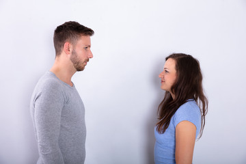 Two Businesspeople Looking At Each Other