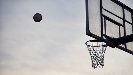 Baskaetball flying into the hoop