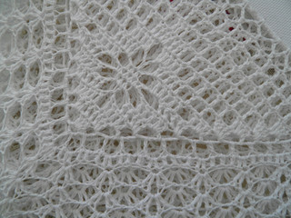 white mat doily background