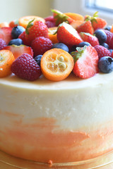 Cake with berries on top.