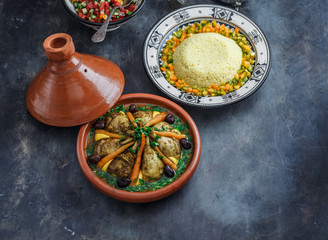 Moroccan tajine with chicken and carrots, copy space