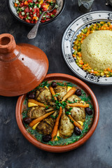 Chicken tajine with couscous and salad, morrocan cuisine
