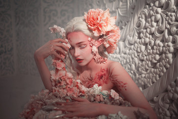 Young beautiful girl elf. Creative make-up and bodyart