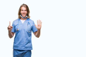 Young handsome doctor man with long hair over isolated background showing and pointing up with fingers number six while smiling confident and happy.