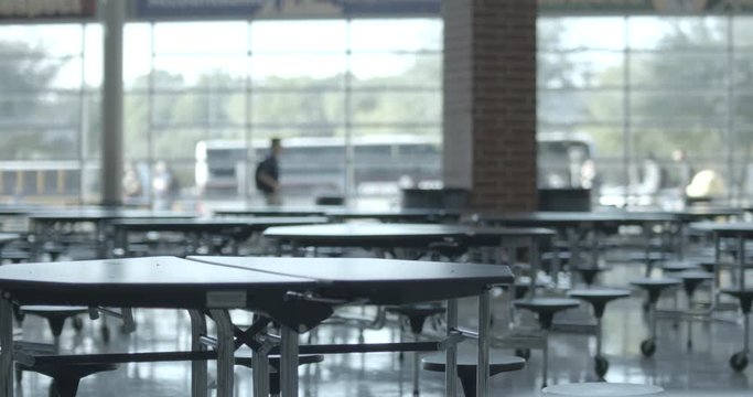 High School Cafeteria with Students Walking by on their way to Class