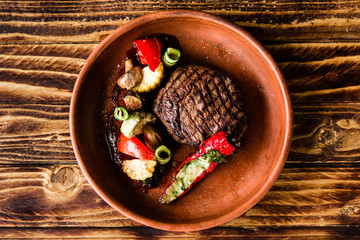 chic delicious steak with vegetable garnish
