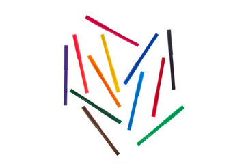 Colorful pens on white background
