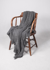 Grey blanket on the chair