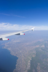 Fototapeta premium Ariel view from an airplane flying, wonderful landscape underneath