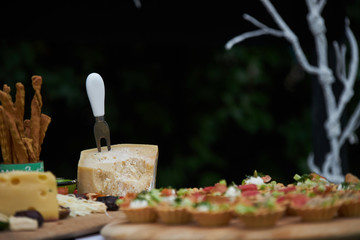 Party table at the garden. Table Food Lunch Variety Outdoors decorations 