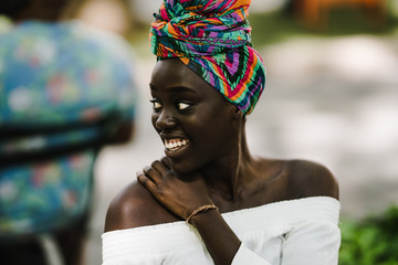 Woman in headscarf smiling